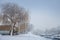 Selective blur on Panorama of the Tamis river, on Pancevo Waterfront in the center of the city, during a cold winter snow storm.