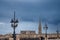 Selective blur on people walking in front of a bordeaux panorama and the tower of the Basilique Saint Michel basilica