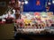 Selective blur on a stand of Belgrade christmas market selling Candies, candy sticks, sweets and lollilpops, diversified, display
