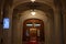 Selective blur on wooden doors and opulent design of the interior of the Romanian palace of