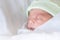 Selective focus of asian newborn baby boy sleeping at hospital