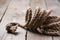 selective focus of beige knotted nautical rope on wooden