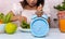 Selective focus of blue clock with schem of eating and Interval fasting diet concept