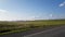 Selective focus. Blurry view from the car. Quick trip. Cars go by. Wind. Steppe Of Khakassia