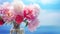 Selective focus on a bouquet of fresh tender white, pink, purple and red peonies in a glass vase