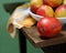 Selective focus bowl of delicious ripe mangos on a wood table