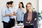 Selective focus on Caucasian businesswomen Crossed arms and smile to meet with business people Ethnic diversity in the office