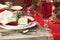 Selective focus Christmas dining scene on rustic table