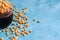 Selective focus closeup shot of scattered corn kernels fallen from a container