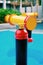 Selective focus at colorful sprinkler in water park