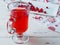 Selective focus on cranberries in a fresh drink in a glass cup