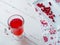 Selective focus on cranberries in a fresh drink in a glass cup