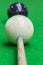 Selective focus on cue and white snooker ball dirty blue chalk p