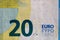 Selective focus on detail of euro banknotes. Close up macro detail of money banknotes, 20 euro isolated. World money concept,