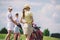 selective focus of female golfers with golf equipment walking