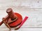 Selective focus gavel with prayer beads isolated on wooden background.