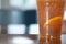Selective focus in a glass iced tea orange and grapefruit