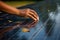 Selective focus on a hand checking a solar panels surface, promoting renewable energy