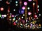 Selective focus on hand painted paper ball lanterns along main entrance street of KHON KAEN university in KHONKAEN province, THAIL