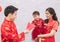 Selective focus on happy father provide envelop angpao for kid baby on Chinese New year Traditional  Chinese family spent time