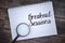 Selective focus image of magnifying glass with Breakout Sessions wording on wooden background.. Business concept