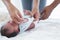 Selective focus on mother hand of Asian Australian newborn baby sleeping while her mom is changing diapers and clothes little baby