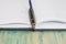 Selective focus of the pen on opened lined diary book