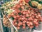 The selective focus photo of artificial orange flowers