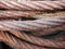 Selective focus of a pile of rusty wire slings