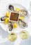 Selective focus point on fresh oysters shell with lemon and glasses of champagne