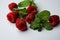 selective focus, raspberry berries with mint, macro