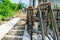 Selective focus on the reinforcement steel for concrete structure with blurred workers in background at construction site