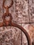 Selective focus on Rusted handle of Chapel`s bell chain handle