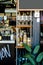 selective focus of shelves with jars with cereals, glasses and bottles