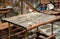 Selective focus shot of bamboo craft table with a blurred background