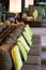 Selective focus shot of a brown comfortable sofa with green pillows