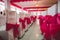 Selective focus shot of chairs and tables with a decorative ribbon style in a wedding reception