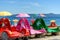 Selective focus shot of colorful catamarans against the blue sea