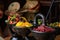 Selective focus shot of delicious Ethiopian food with fresh vegetables on a wooden table