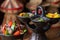 Selective focus shot of delicious Ethiopian food with fresh vegetables on a wooden table