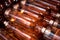 Selective focus shot of a heap of bottles of rose wine