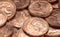 Selective focus shot of a pile of Brazilian coins