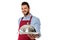 Selective focus of smiling bearded waiter holding tray and cloche