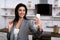 Selective focus of smiling businesswoman with