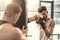 selective focus of sportsmen training with punching bag