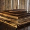 selective focus of stack of different wooden cutting boards on wooden table