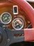 Selective focus of steering wheel and dashboard of classic car