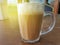 Selective focus of Tea with milk in a mug or popularly known as Teh Tarik in Malay language.