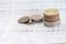 Selective focus of Thai`s coins stacked over page of Bank account statement on  white background, Collecting money for investment