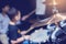 Selective focus to cymbals of drum set with blurry kid learning and play drum set with teacher in music room. The concept of